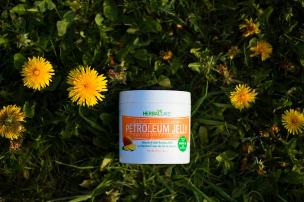 HERBAL CARE SMOOTHES & REPLENISHES DRY SKIN PETROLEUM JELLY MANGO OIL 10oz grass